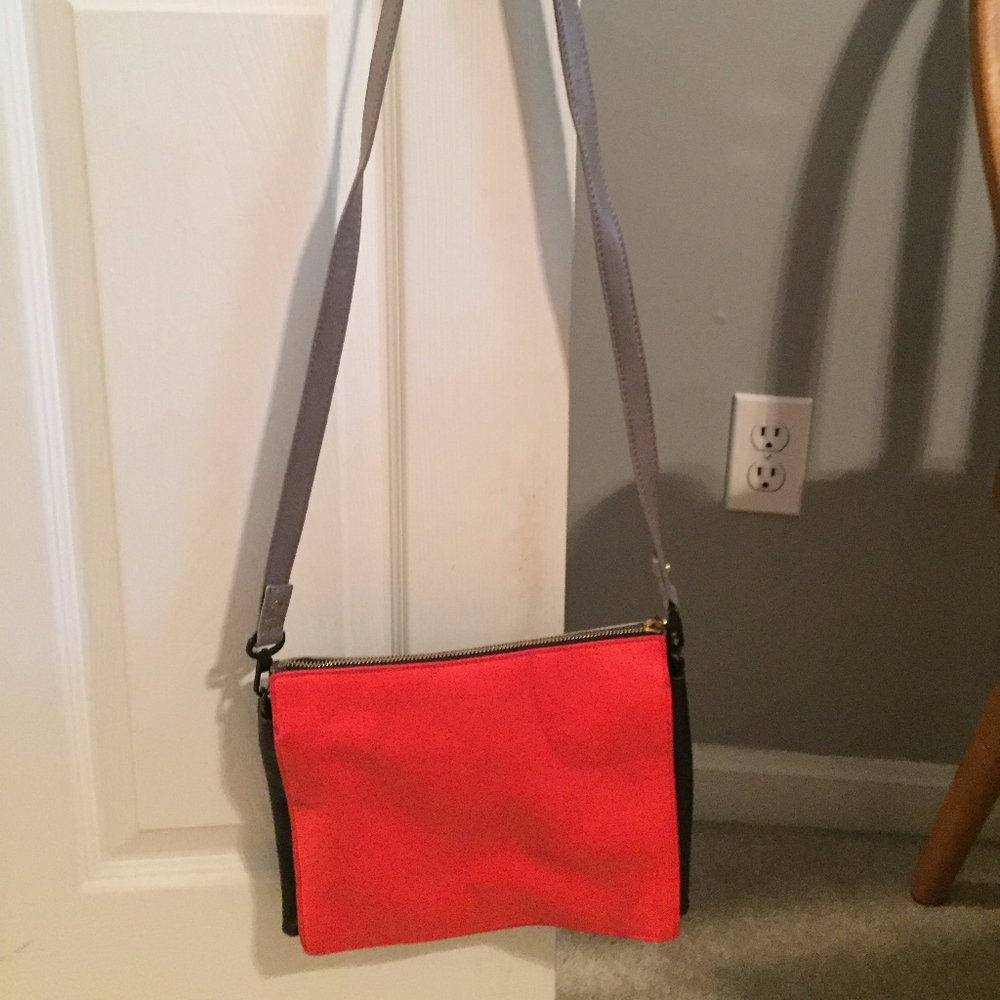 Red and grey leather reversible crossbody bag
